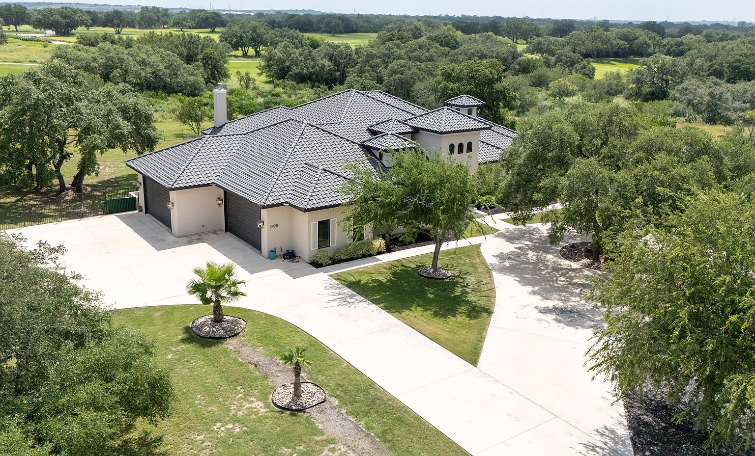 Aerial view of the front and driveway